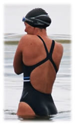 Picture of Lorraine wearing a swimsuit looking out to sea